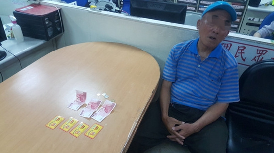 臺老翁私吞錢款被捕無悔意:撿到的錢都不會還(圖)